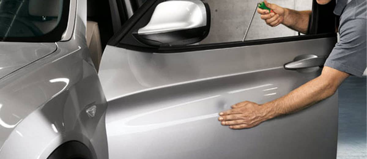 Débosselage avec ou sans peinture : que choisir ?